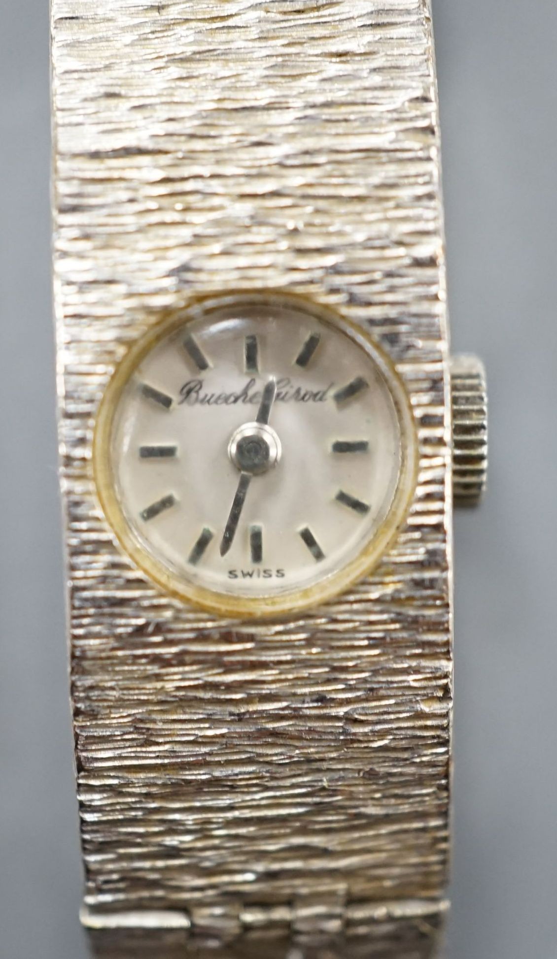 A lady's 1960's textured 9ct white gold Bueche Girod manual wind bracelet wrist watch, 16.5cm